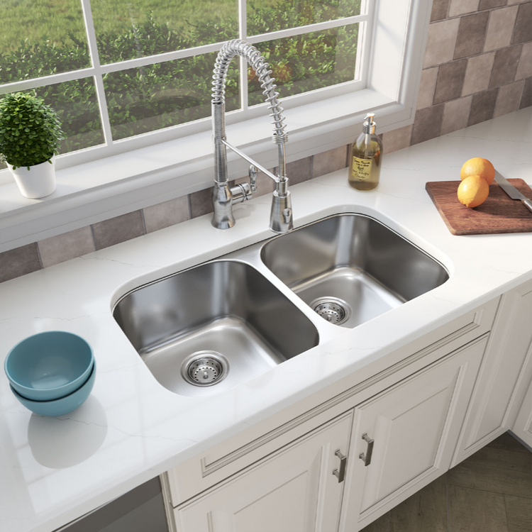 Stainless Steel Double Bowl Undermount Sink in a White Quartz Countertop